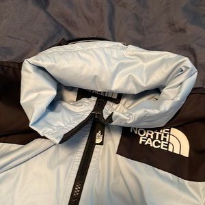 North face windwall light blue and black with a sip in hood